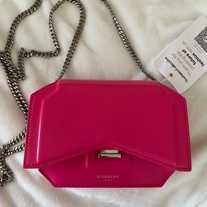 Givenchy bow crossbody bag. Removable silver chain. In excellent used condition.